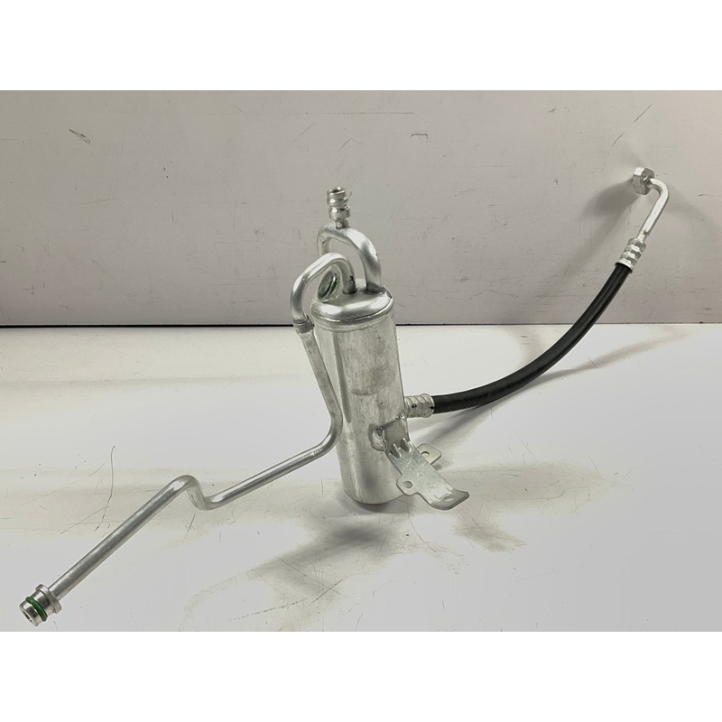 NEW - OUT OF BOX 83110 A/C Receiver Drier With Hose Assembly
